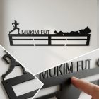 2 mm-es acéllemez lézervágott éle és prémium matt porszórt felülete közelről – futós éremtartó