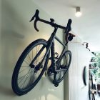 Pedal wall bike rack
