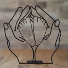 Minimalist protective hands line drawing