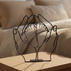 Minimalist protective hands line drawing