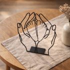 Minimalist protective hands line drawing